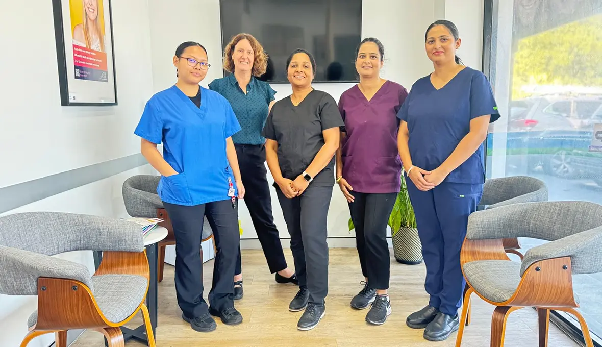 Group photo of the Sure Smile Dental team, showcasing their friendly and professional demeanor in the clinic.