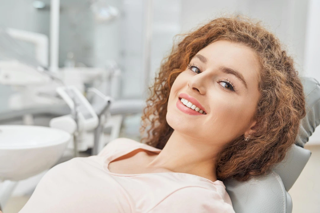 happy-patient-dental-chair-checkup-results. happy-patient-dental-chair-checkup-results